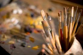 paint brushes in a jar for art class