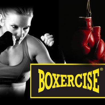 Belmont boxing & fitness image of boxing gloves and a female boxer in a defensive stance